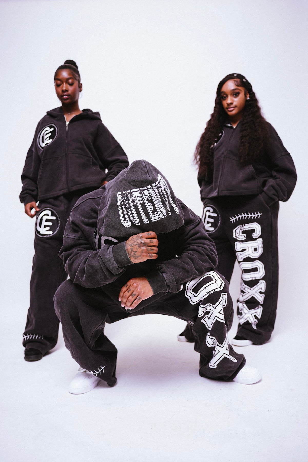 “Before the fame”  black and white sweatsuits